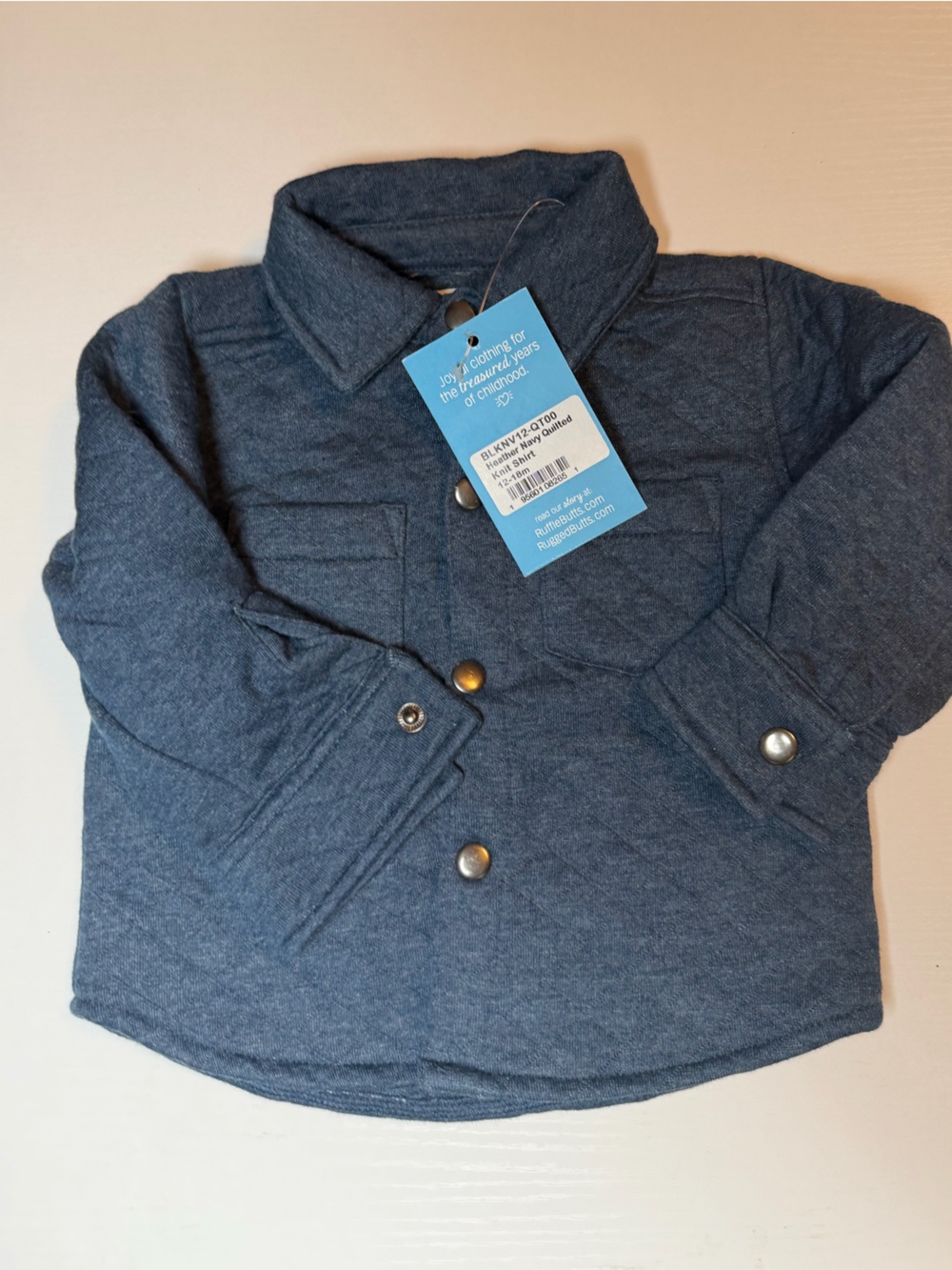 Ruffle Butts Navy Blue Quilted Snap Jacket